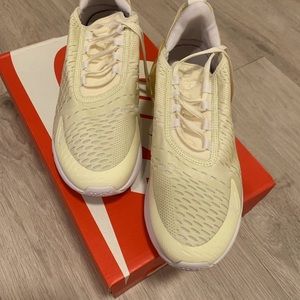 Nike pale yellow sneakers